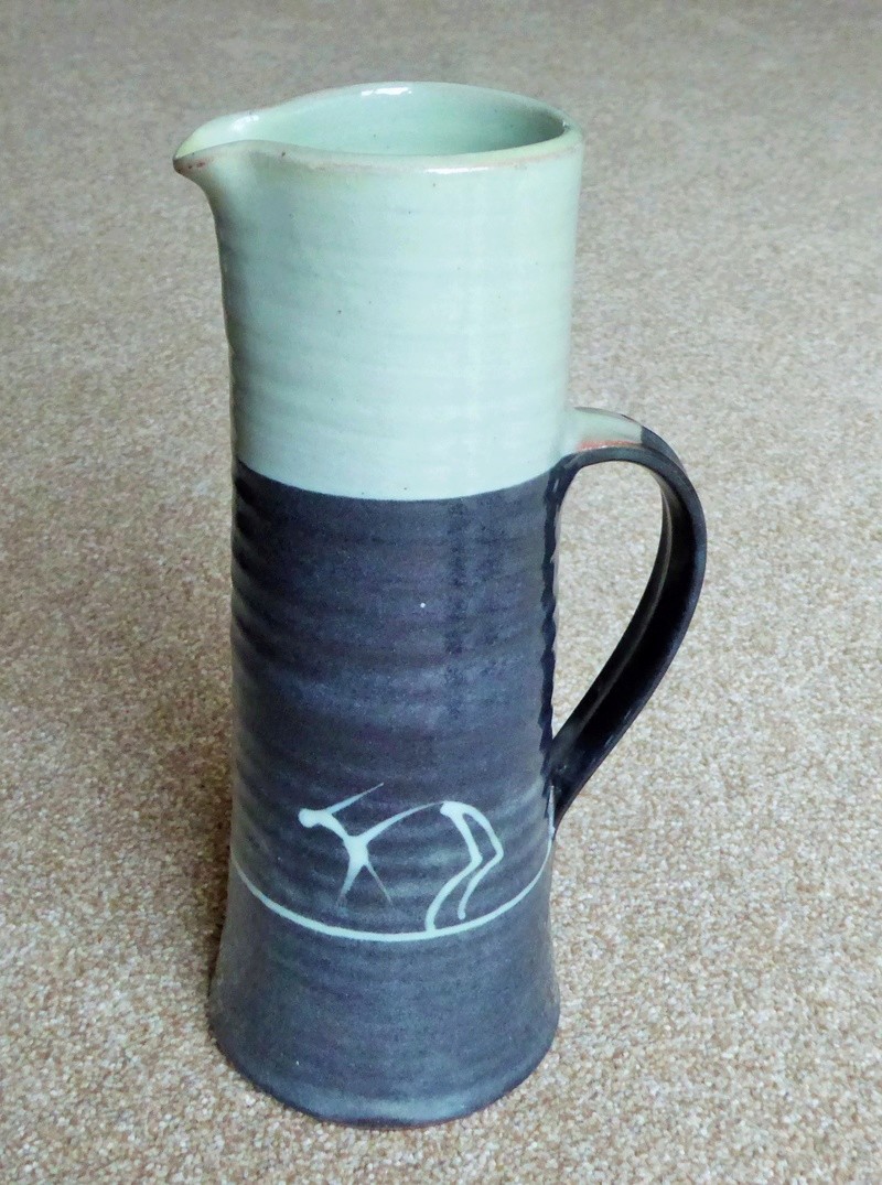 slender Slipware jug with animal figures. KI or KJ mark P1050813