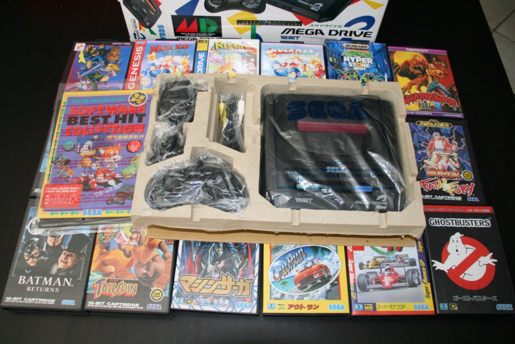 [ESTIM] Console Megadrive 2 PAL ASIAN avec 18 jeux complets Img_0311