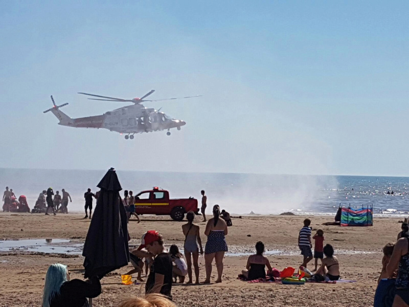 TRIPLE DROWNING AT PACKED BEACH Bathers look on in horror as medics battle in vain to save three swimmers  Nintch21