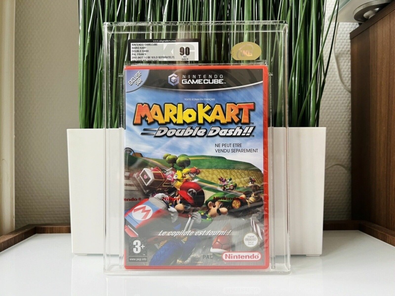 Polémique: Le faux Mario Kart boitier rouge sous blister gradé ?  Mario_13