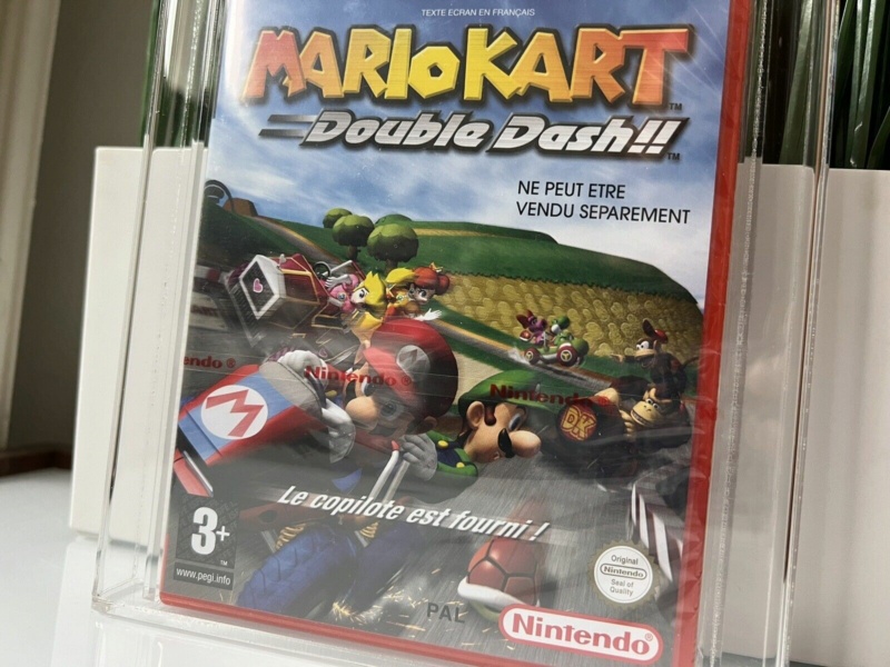 Polémique: Le faux Mario Kart boitier rouge sous blister gradé ?  Mario_14