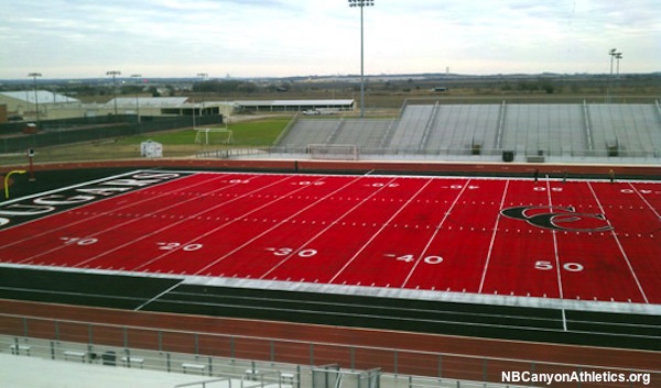  School unveils nation's first red turf high school field Ept_sp11