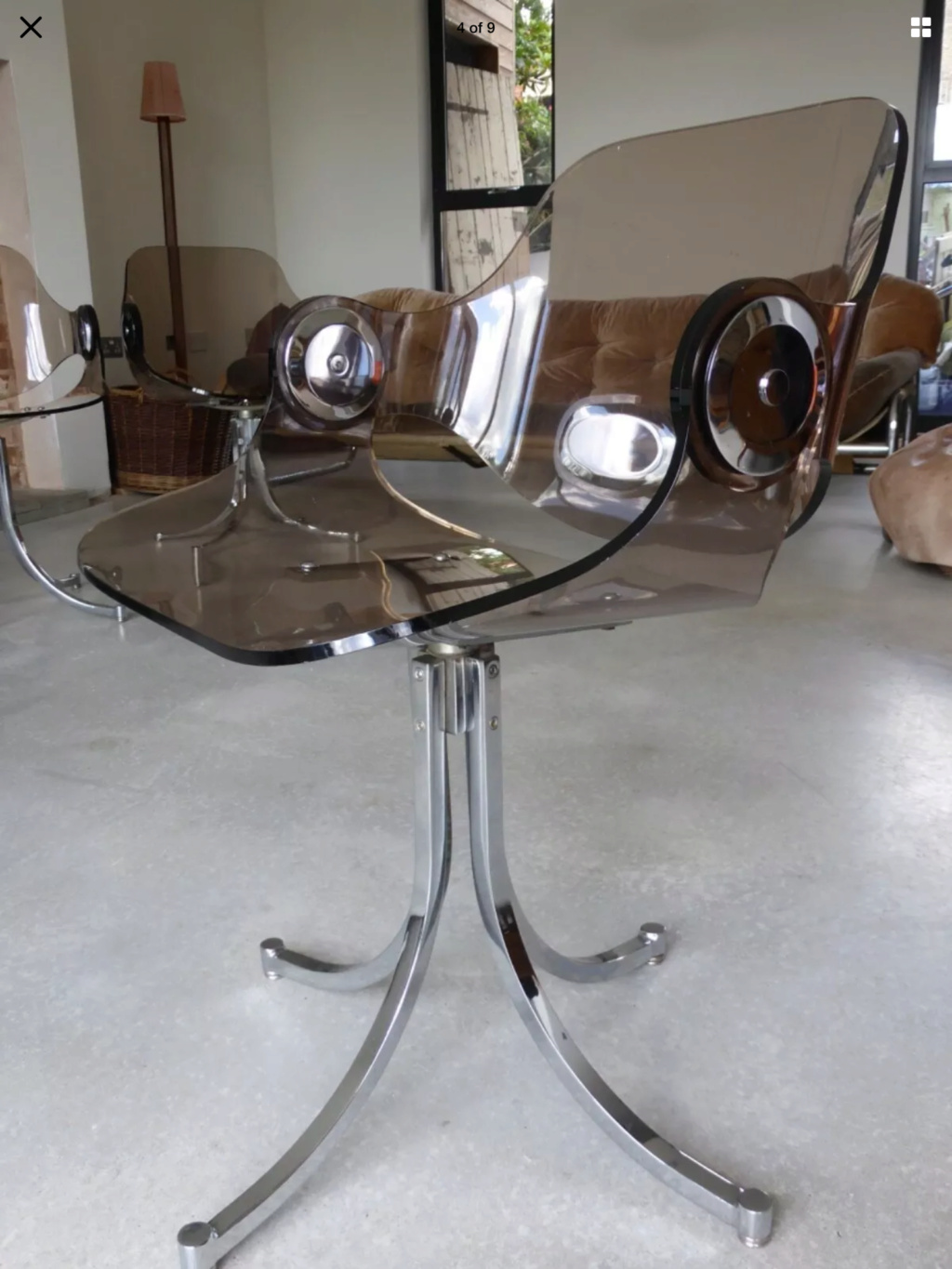 Help needed to identify Lucite swivel Chairs Image110