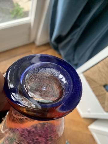 Cranberry iridescent vase with heavy blue base Img_8912