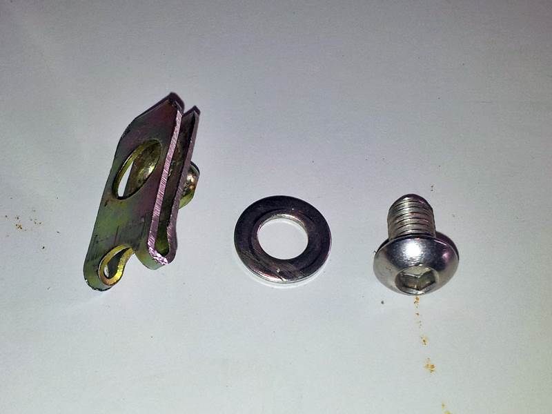 Getting those pesky muffler cover screws out. Heat_s10