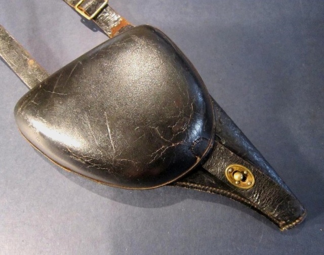 Les etuis du revolver modele 1873/74 et 1892 (etui-jambon) 391