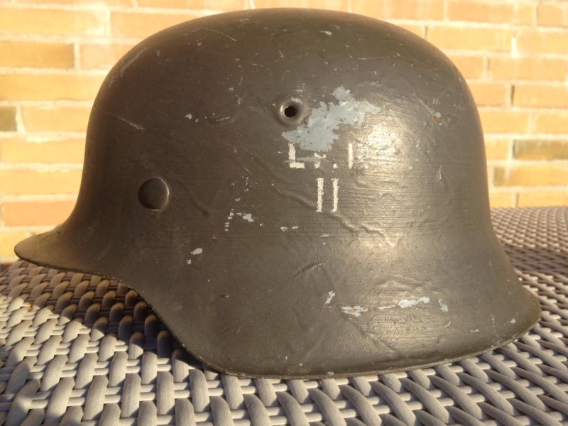 Casques allemands réutilisés par d'autres pays. Attach10
