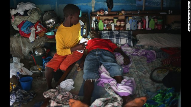 A WORRIED WORLD WATCHES AS EBOLA DEATH TOLL RISES; LIBERIA DECLARES EMERGENCY 14081511