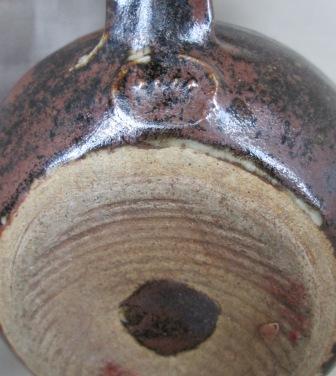 Teapot with four dots? Is Denys Hadfield. Four_d10