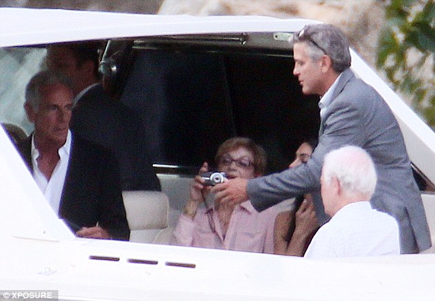 7 July 2014: George Clooney and Amal and their parents on a family trip Boat10