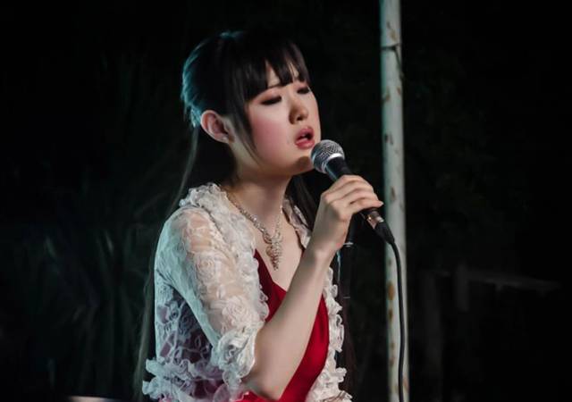 الفتاة اليابانية ناو كوياسو تغني في ارب ايدول  Oiaau_10