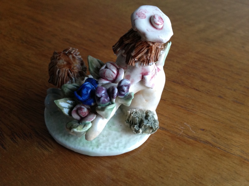 tiny-unmarked-porcelain-figurine