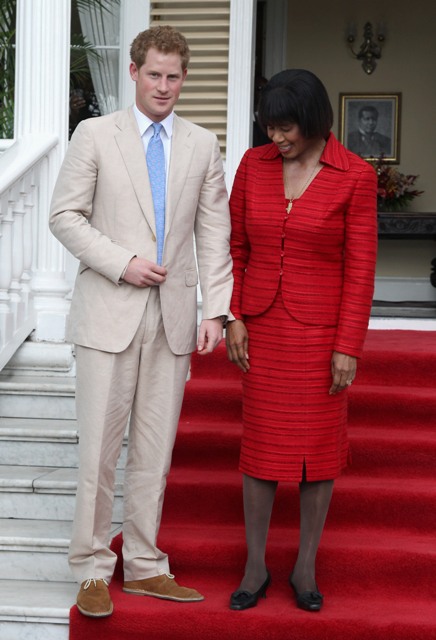 Prince Harry hugs Jamaican Prime Minister Portia Simpson Miller Prince18