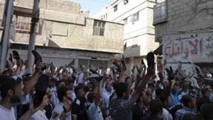 فى أول جمعة بعد رمضان.. الأمن السورى يقتل 6 محتجين فى عدة مدن 2011-174