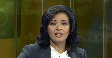 مجهولون يعتدون على "منى سلمان" مذيعة الجزيرة S9201120