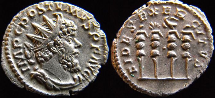 Les enseignes militaires dans la numismatique romaine Postum28