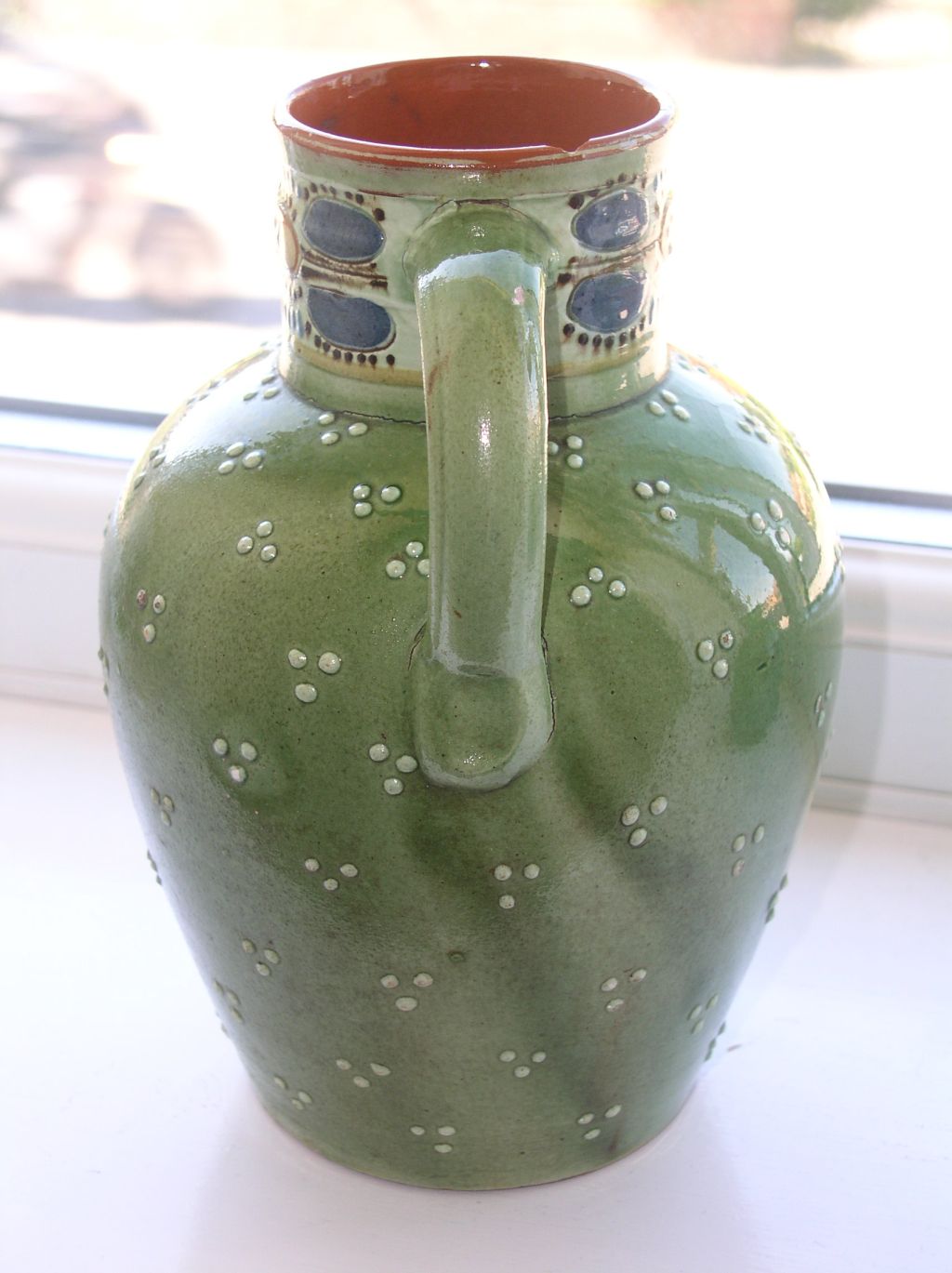 An old green jug with ladybird pattern - Paul Wranitzky P1010219