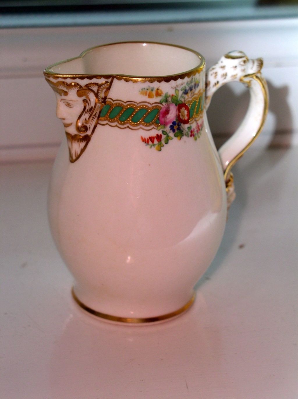 Delicate little cream jug with mask spout??Unmarked P1010815