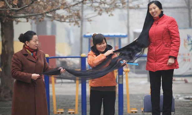 صينية يبلغ طول شعرها 2.53 متر Large10