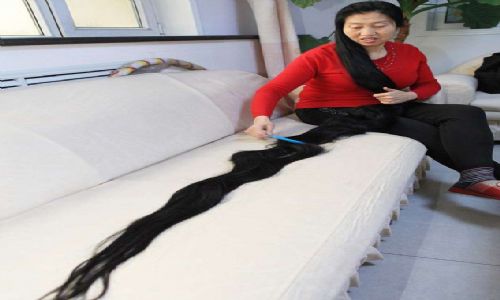 صينية يبلغ طول شعرها 2.53 متر Super110