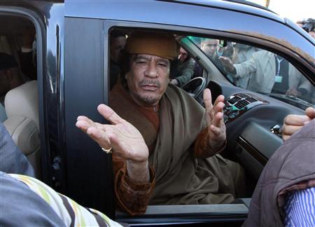 القذافي يسعى المحادثات، ويدعو إلى وقف إطلاق النار Alamer17