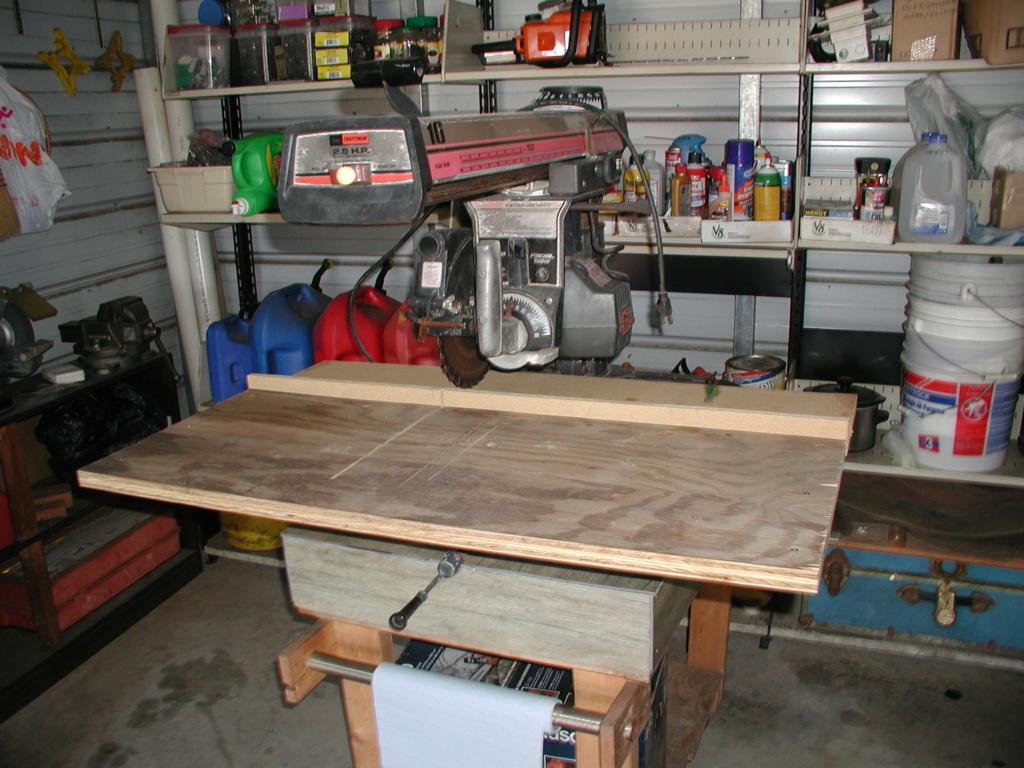 A Craftsman radial saw, the constructed Tyco Cosmic Wind display rack, and the burn pile P1012637
