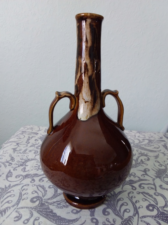 Double handled urn vase was made by Orzel 16190510