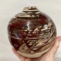 Red globe shaped vase with leaf mark  1428d610
