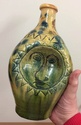 bottle with faces - Bredene / Ostend, Belgium  5ce42f10