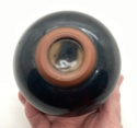 Small unmarked black bowl  7871e310