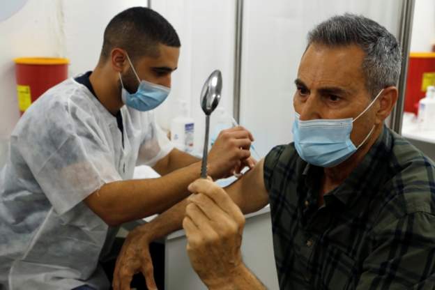 Uri Geller 'snaps spoon' while getting coronavirus jab in Israel 9d698110