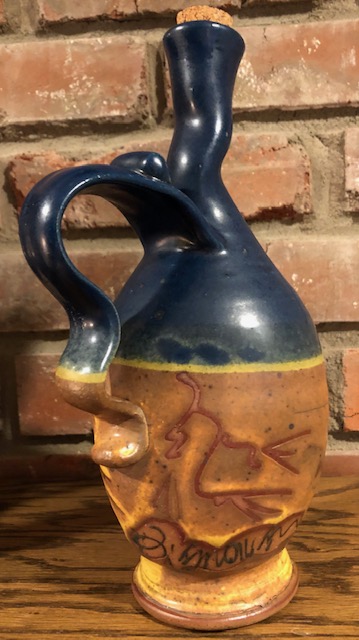 Curious of pottery oil bottle maker, signature illegible to me Oil310