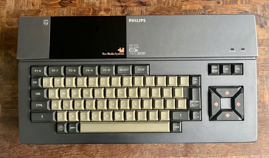 Lot MSX2 Philips NMS-8220 + 13 jeux (Metal Gear, OutRun, Nemesis, Road Fighter, The Cockpit...) 4f4aad10