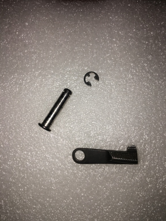 Slide stop with removeable pin 17341610
