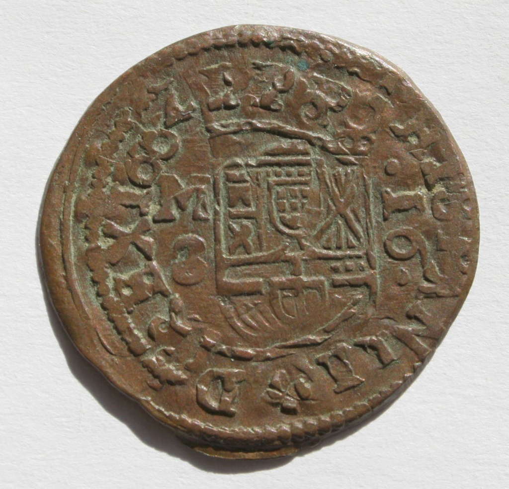 Doble acuñación en una moneda a rodillo. 16 maravedís de Felipe IV, Madrid. Felipe13