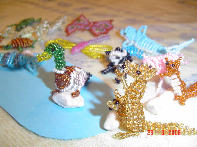 personnages en perles swarovski et animaux en rocailles 02310