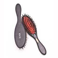 Peigner les cheveux de la femme musulmane Brosse10