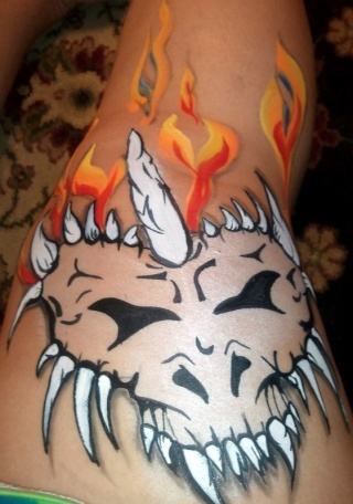 Doodling on my leg, one stroke hearts and dragon skulls...  Dragon10