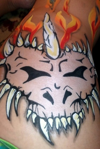 Doodling on my leg, one stroke hearts and dragon skulls...  Dragon11