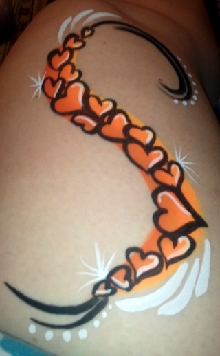 Doodling on my leg, one stroke hearts and dragon skulls...  One_st10