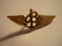 Can anyone I.D this badge for me please !,  could it be a  Bentley Emblem ! Badge_10