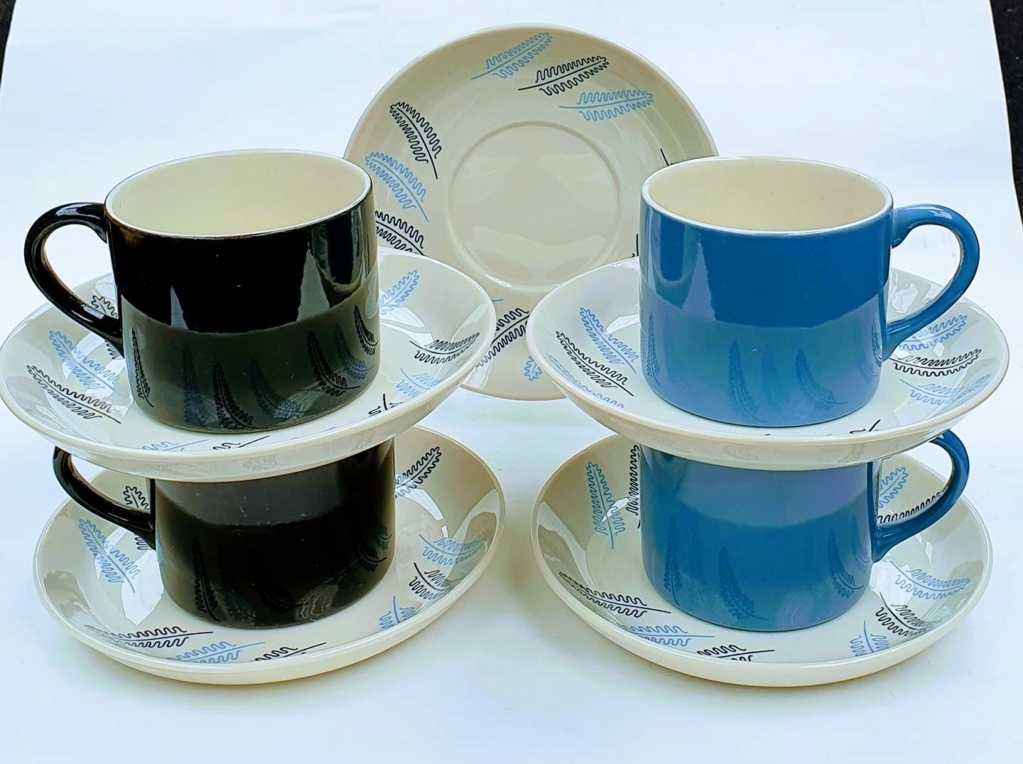 Coffee Cans with blue and black leaves on the saucers Coffee10