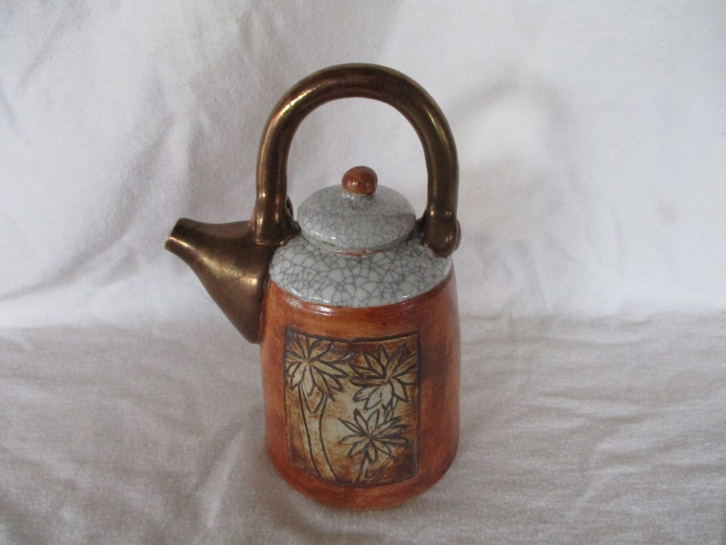 Mystery Koru mark on beautiful teapot was made by Julia Watson Louise10