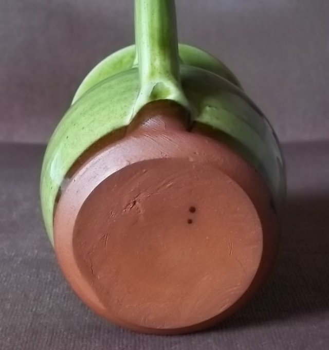 Small terracotta slip decorated jug 100_5178
