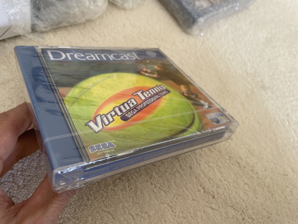 [Estim] Lot NEUF sous blister unique : Dreamcast + 7 jeux + 3 manettes +2VM + 3vibrations + clavier + volant Img_2013