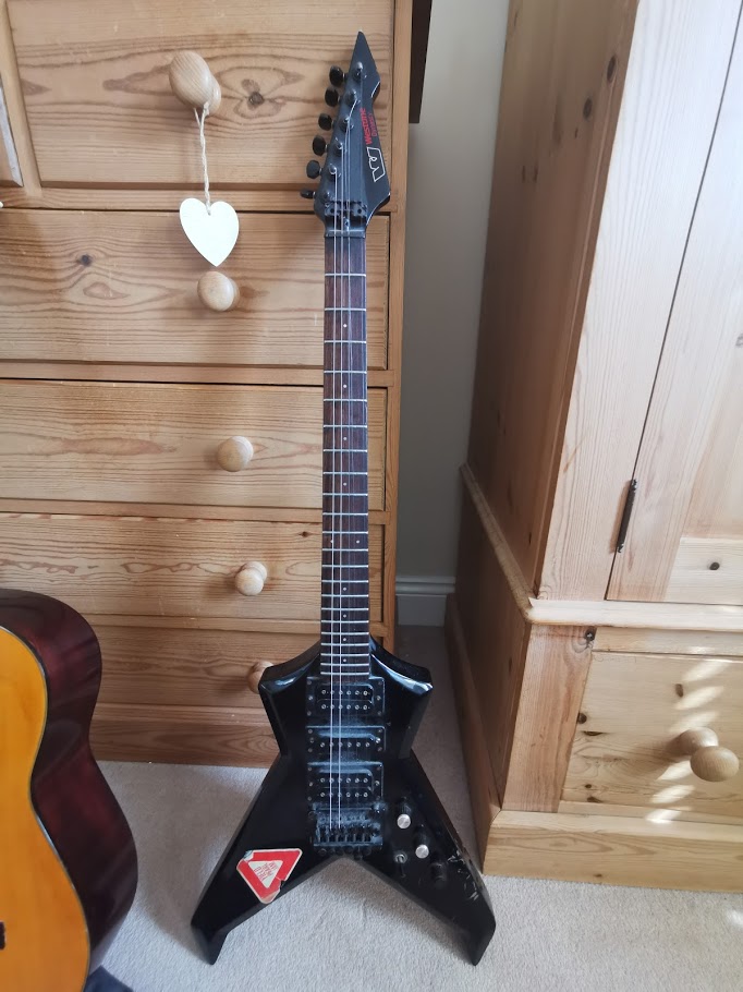 guitar - Yes! I found my first ever guitar from my childhood. I thoguht I had lost it forever. Operation Dynasty Restore Guitar10