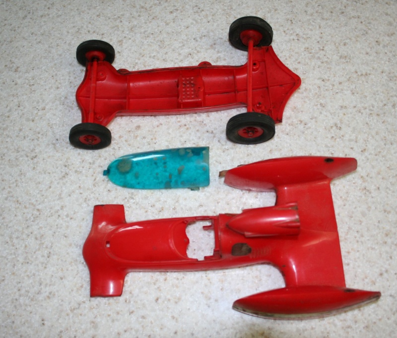 What is the value of a Cox red plastic Shrike tether car? Shrike14