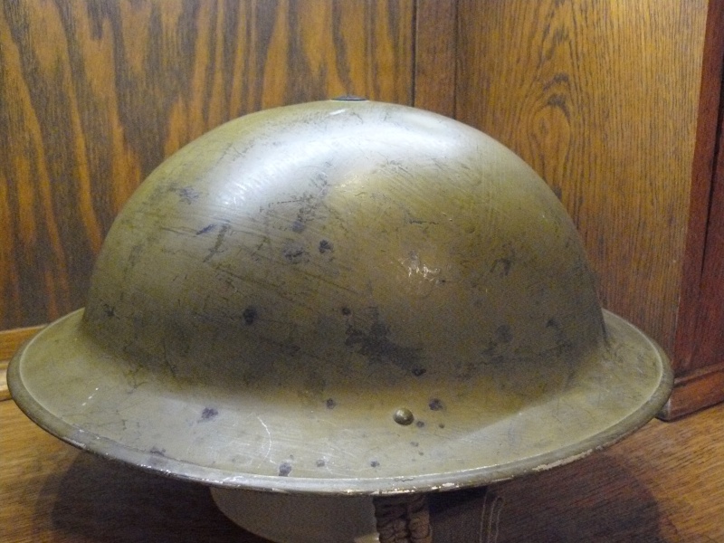 Lets see your favorite worn Canadian/Commonwealth helmets with nice aged patina Pictur84