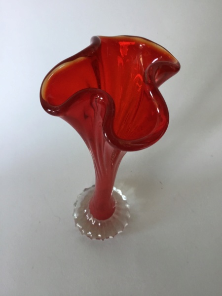 Light red glass vase, frilly lip, clear moulded or shaped base 241ed510