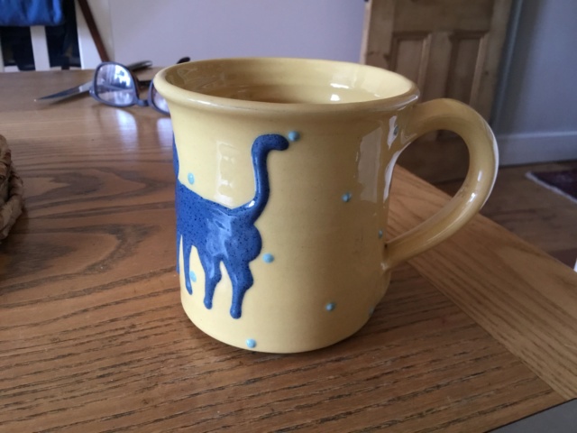Studio pottery cat mug, raised blue cats 687e1310